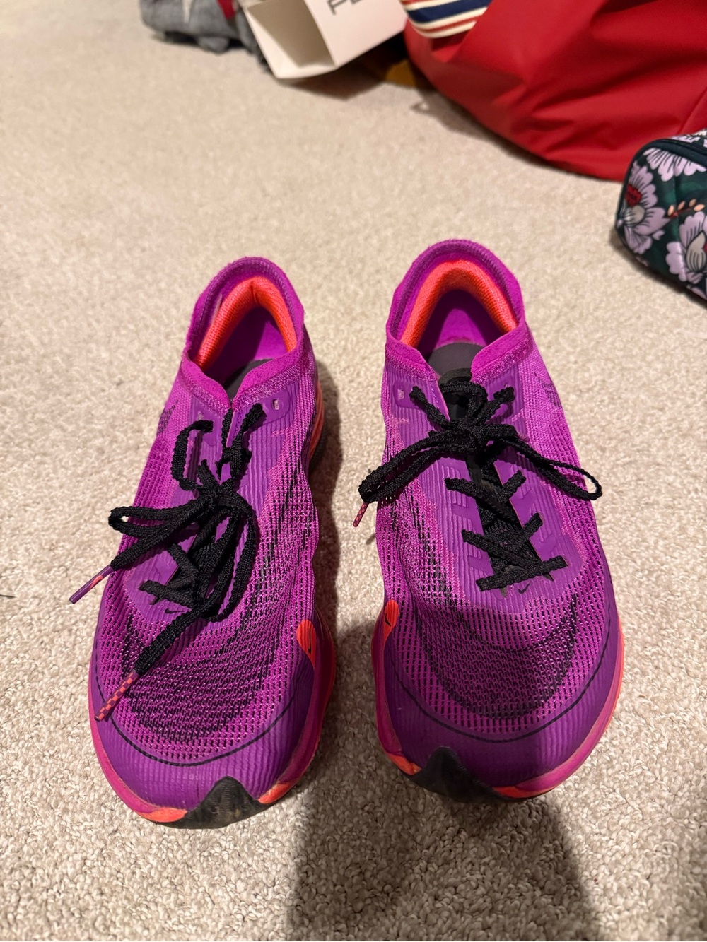 Nike Women's Purple Running Shoes with Black Laces and Orange Accents
